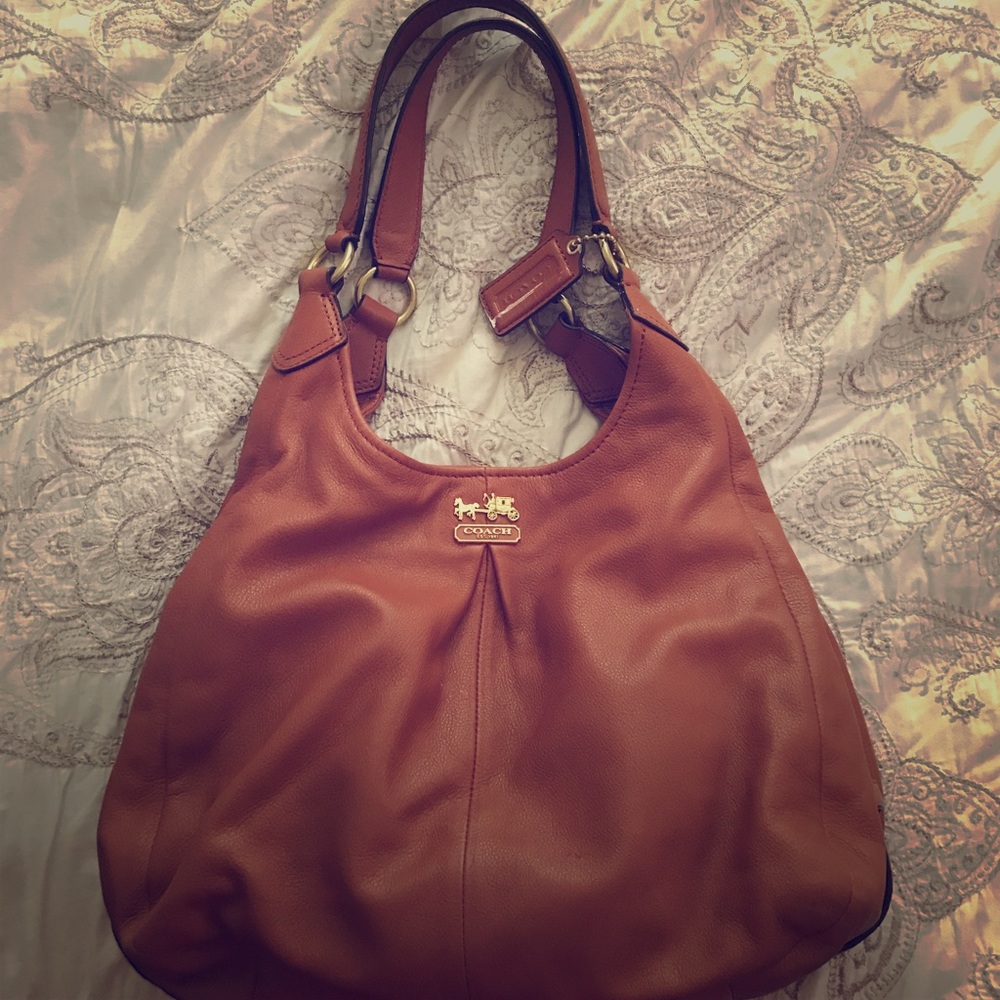 Brown leather coach bag